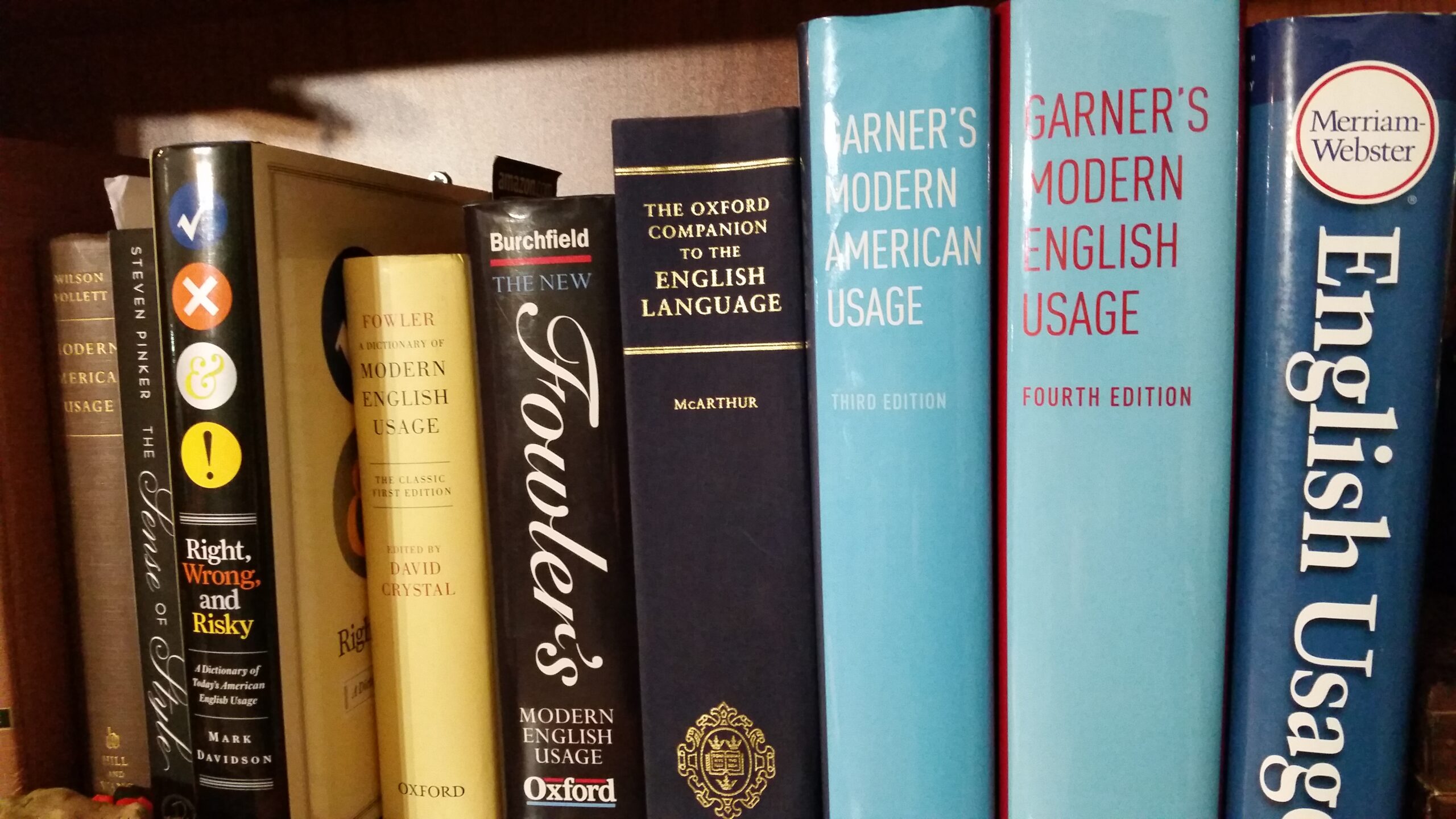 Shelf of various English usage guides