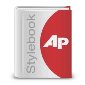 Upright gray and red book with Stylebook AP on the cover