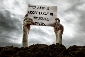Zombie hands coming out of the dirt and holding a sign that says "'Try and' is acceptable in informal texts."